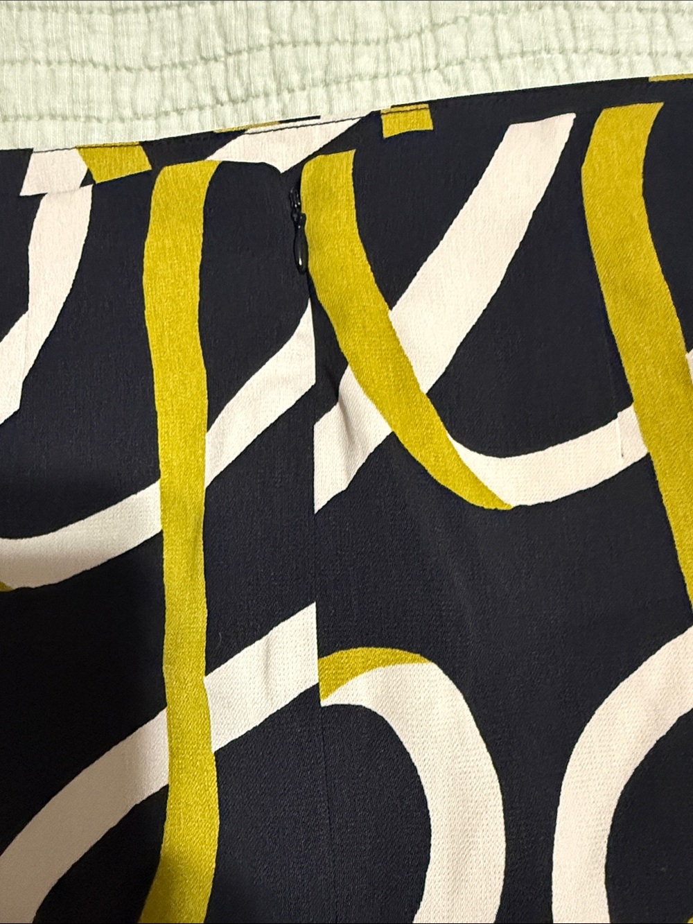 NWOT Black Patterned Pencil Skirt with Yellow and Green Swirl Print - Picture 3 of 4